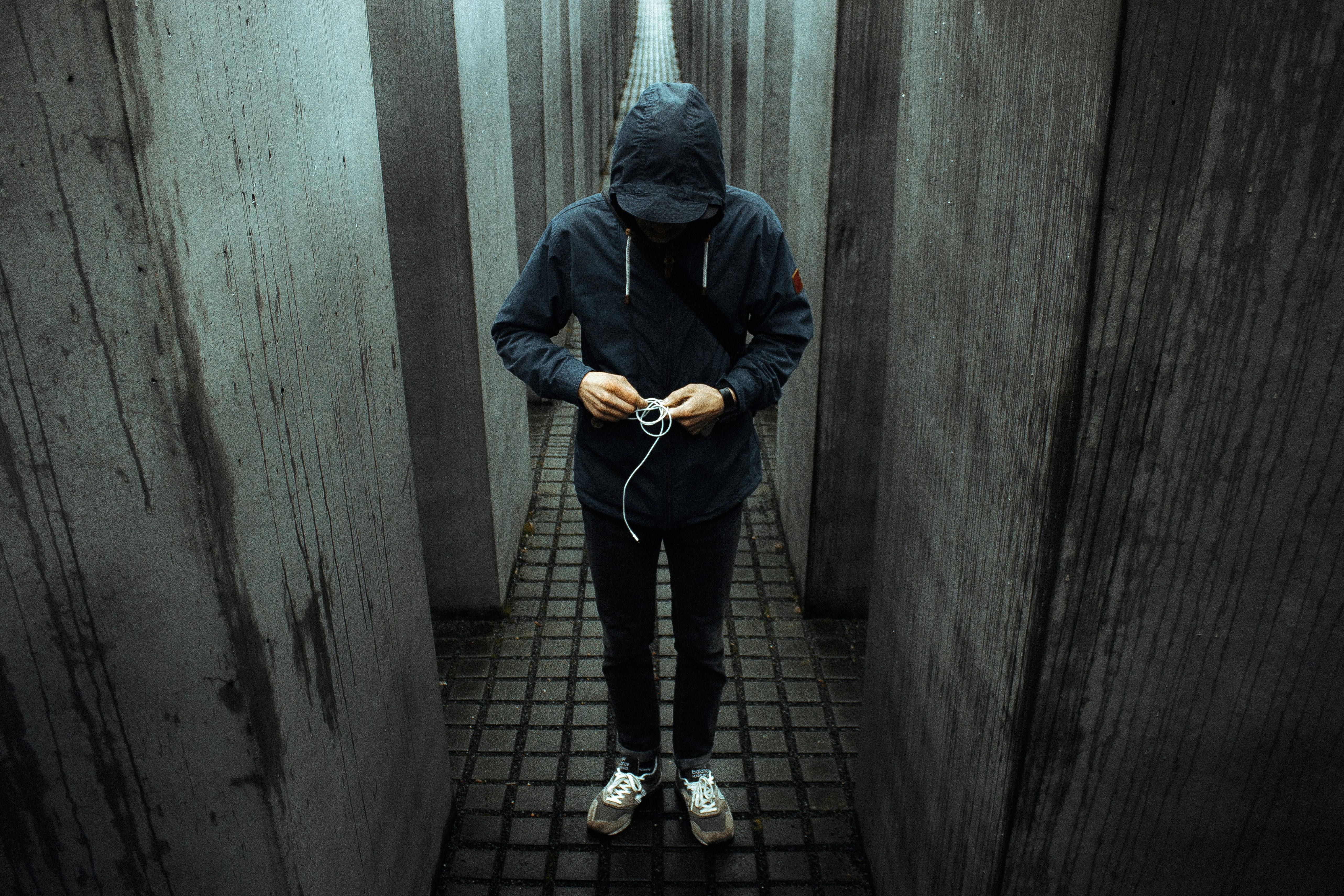 photo of person wearing black pullover hoodie